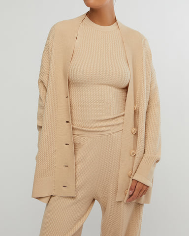Oversized Cardigan by WeWoreWhat | oversized cardigan is made from cozy cable knit with drop shoulders and ribbed trimming. Relaxed fit Button-down | Coretrade located in Boca 